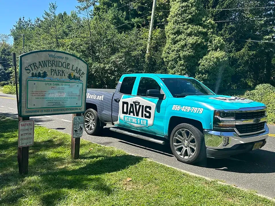 Davis Heating & Air truck in Mt Laurel in front of Strawbridge Lake Park.