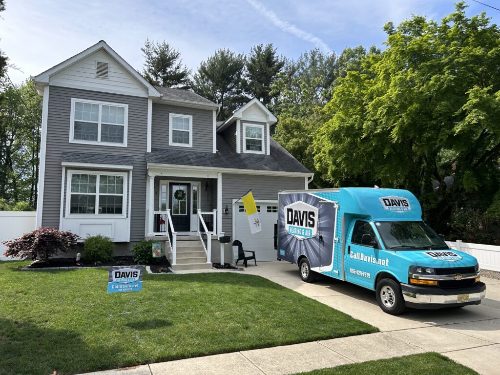 a Davis Heating and Air truck parked outside a home in Evesham Township, ready to perform HVAC services