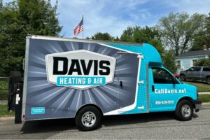 Davis Heating and Air branded vehicle delivering a new HVAC system to a local veteran