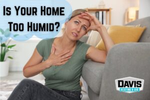a woman sweating and feeling hot due to high humidity causing her HVAC system to work harder in Cherry Hill, NJ